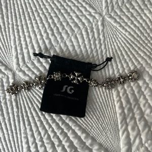 Sergio Gutierrez liquid metal bracelet. Snap clasp with SG.